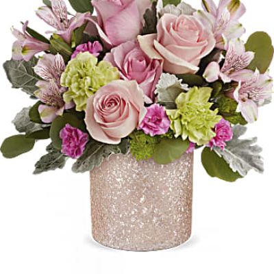 Shower mom with love using our dazzling Teleflora's Blooming Brilliant cylinder, adorned in ballet pink shimmer, the perfect vessel for a dreamy Mother's Day bouquet, sure to be cherished for years to come.