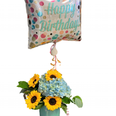 Add celebration and good vibes to their special day with the Birthday Vibes arrangement. Cheery sunflowers combine with gorgeous hydrangeas and a mylar balloon to create the perfect way to say “Happy Birthday!” Happiness delivered.