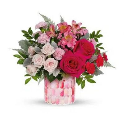 <h3>Take their Valentine's Day breath away with this stylish pink rose bouquet, presented in an artisanal mosaic vase of stained glass that swirls in stunning shades of pink. Hot pink roses, light pink spray roses, miniature pink carnations and dark pink alstroemeria are arranged with pink sinuata statice, leatherleaf fern, huckleberry and dusty miller. Delivered in Teleflora's Precious in Pink cylinder.</h3>
