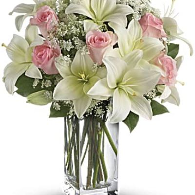 <div id="mark-3" class="m-pdp-tabs-marketing-description">Stunning in its simplicity, this innocent harmony of light pink roses and snow white lilies are a heartfelt way to send your very best. The classic, clear rectangular glass vase keeps the focus on the heavenly beauty of the blooms.</div>
 
<div id="desc-3">
<ul>
 	<li>Light pink roses and white asiatic lilies form a fragrant bouquet with delicate touches of Queen Anne's lace and rich green salal.</li>
</ul>
</div>