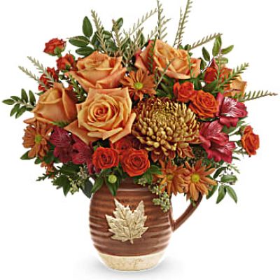 Capture the beauty of cascading fall leaves with this heartwarming rose bouquet in a gorgeous, glazed ceramic pitcher that's food safe for serving. Perfect to decorate your table for Thanksgiving or any special occasion.