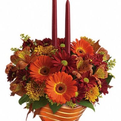 Make your Thanksgiving feast even more irresistible with autumn flowers in a golden glass bowl etched with a graceful wave design. Aglow with soft candlelight - memories are made of this.