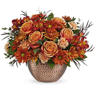 Capture the beauty of fall with the warm autumn hues of this lush rose bouquet, artfully arranged in a copper-finished keepsake bowl with timeless hammered detailing.