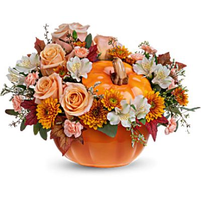 Welcome Fall into your home with this warm and cozy, Hello Pumpkin arrangement. The autumnal mix will add a sophisticated touch with crème roses combined with the warm hues of bronze chrysanthemums and peach mini carnations!